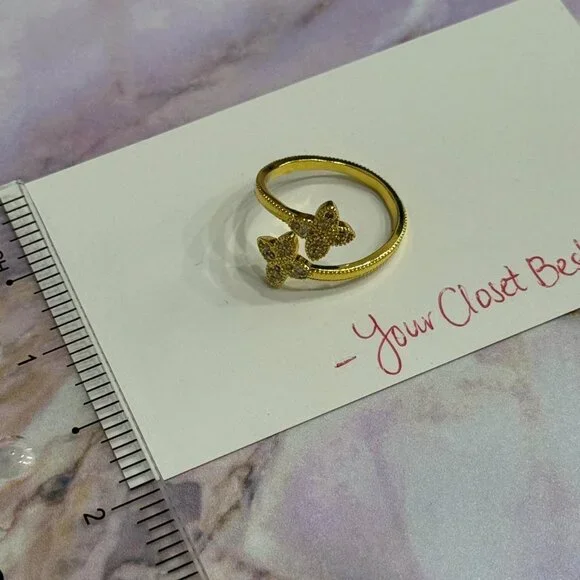 Gold color adjustable 4 leaf clover ring, about a size 7. NEW. Adjustable. - Picture 5 of 5